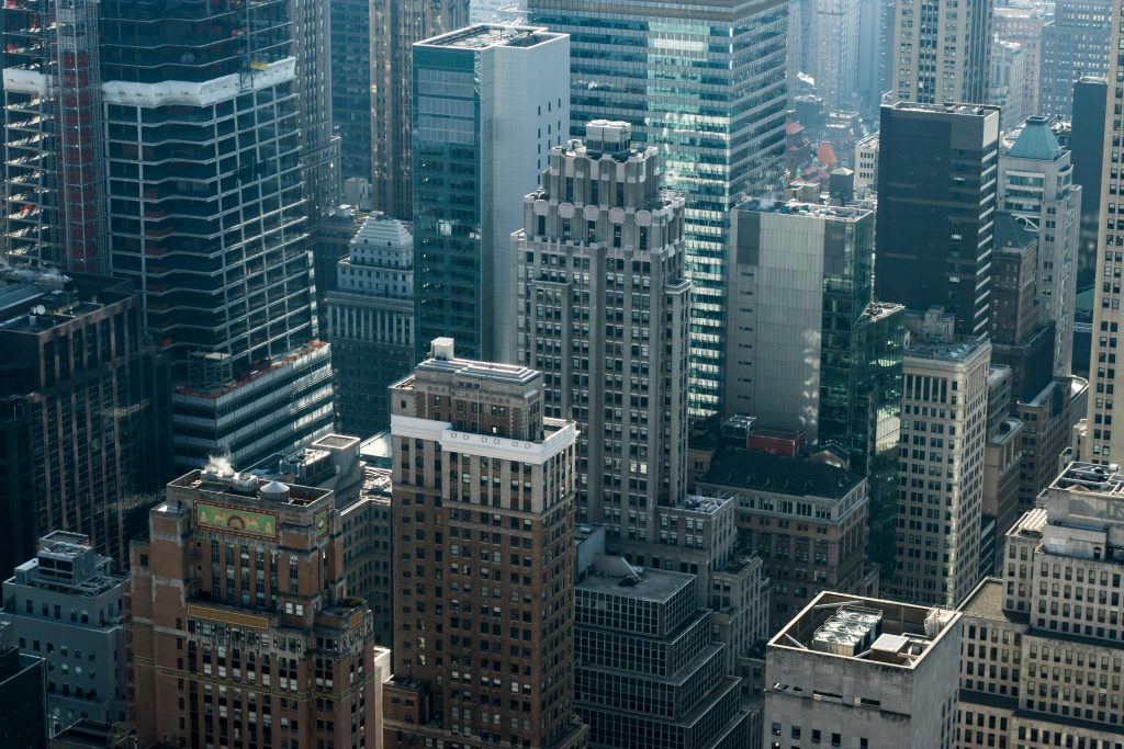 A dramatic aerial view of New York City's towering skyscrapers highlighting urban architecture.